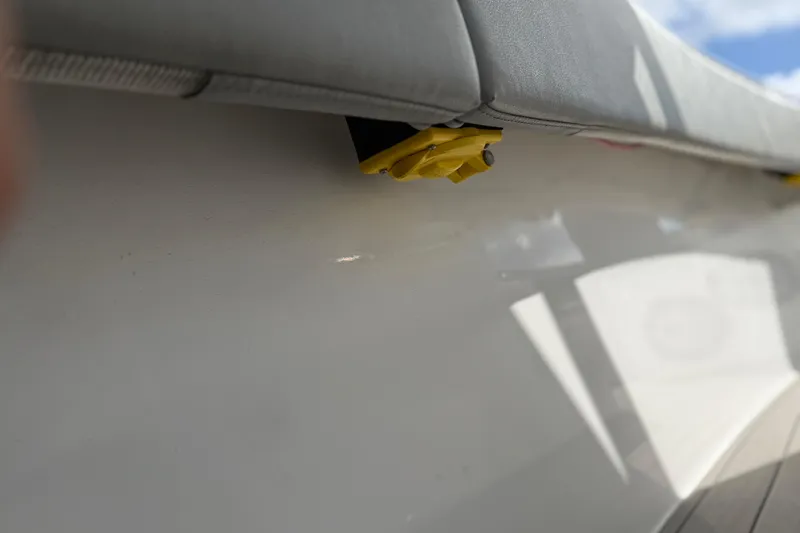  Yacht Photos Pics 2023 Cape Horn 32 XS boat detail with yellow fitting and cushioned seating.