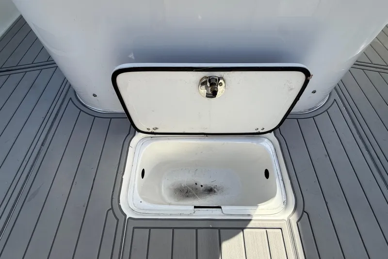  Yacht Photos Pics Open storage compartment on 2023 Cape Horn 32 XS boat deck.