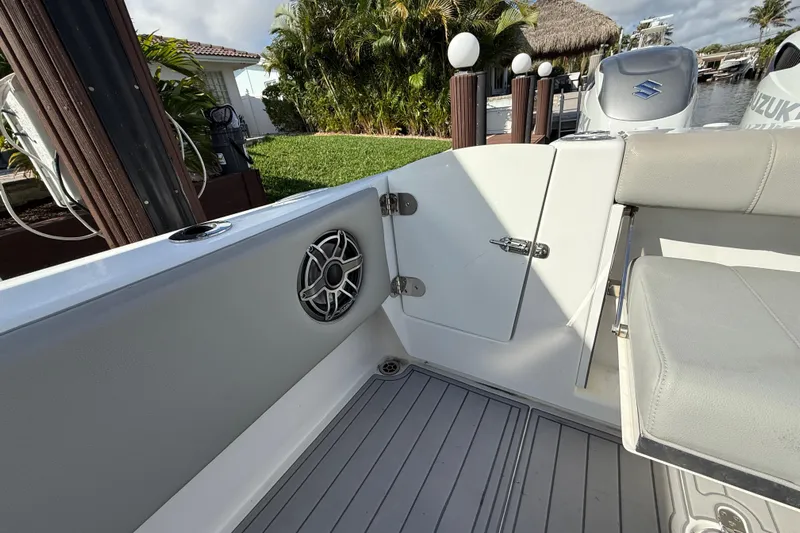  Yacht Photos Pics 2023 Cape Horn 32 XS boat interior with speaker and seating area.