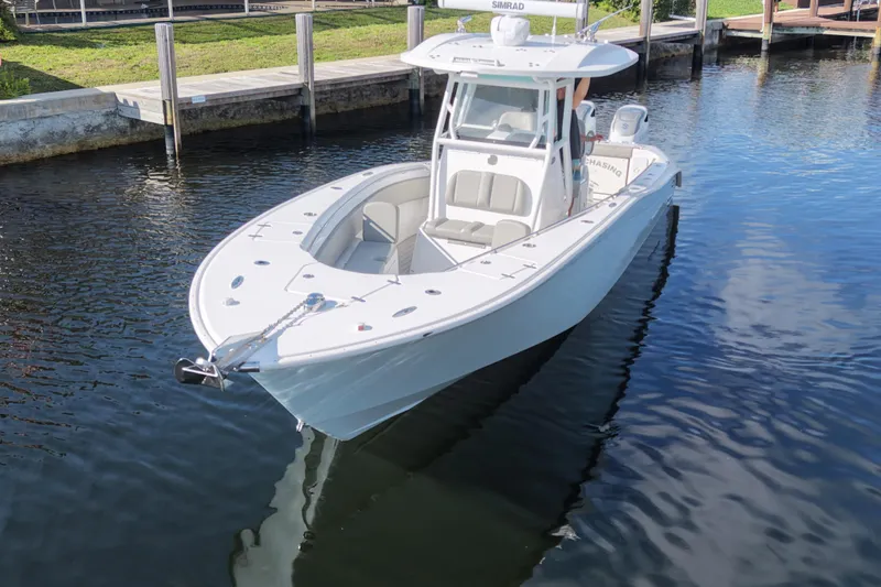  Yacht Photos Pics 2023 Cape Horn 32 XS boat docked in calm waters, showcasing sleek design.