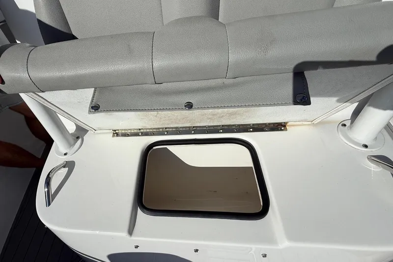  Yacht Photos Pics 2023 Cape Horn 32 XS boat interior with seating and storage compartment.