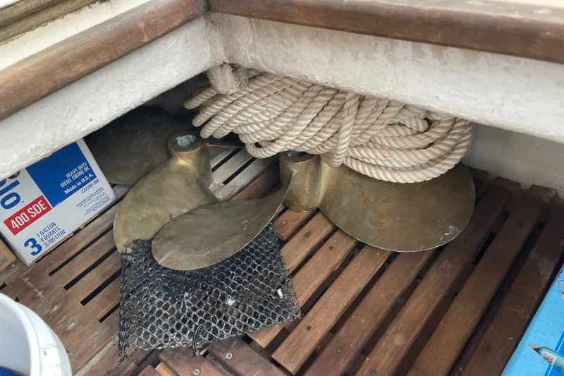  Yacht Photos Pics Boat storage area with propellers, rope, and supplies on a Grand Banks 42 Europa, 1980 model.