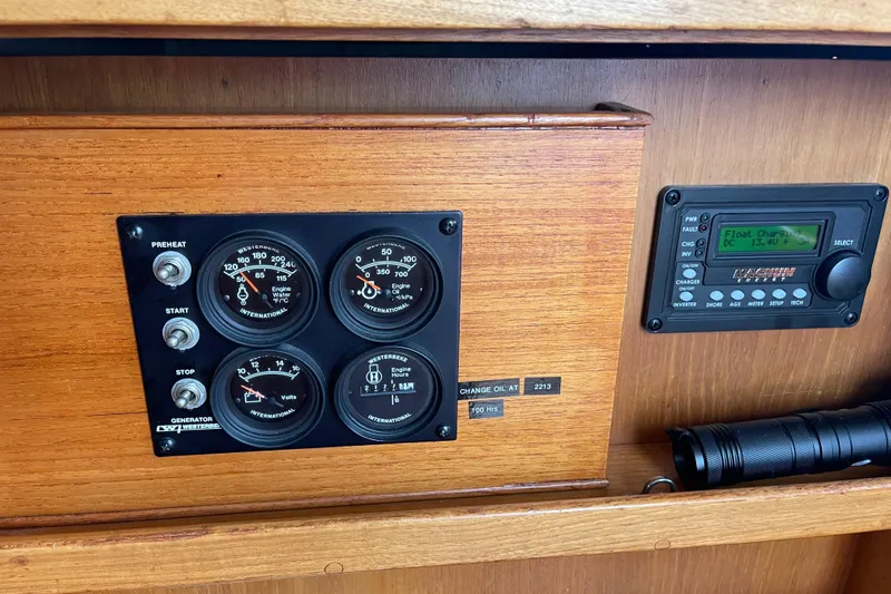  Yacht Photos Pics Control panel of a 1980 Grand Banks 42 Europa boat with gauges and radio.