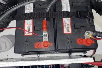  Yacht Photos Pics Dual batteries in a 2003 Regal Commodore 3880 boat, secured with straps.