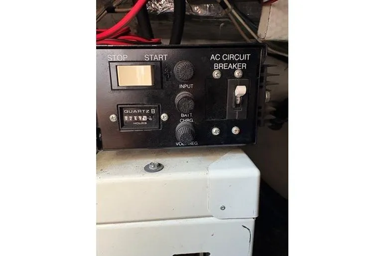  Yacht Photos Pics Control panel of a 2003 Regal Commodore 3880 with AC circuit breaker and hour meter.
