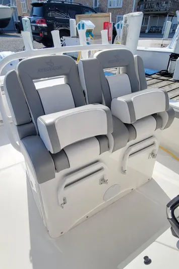 Carly Rose Yacht Photos Pics 2023 Regulator 34 boat seats with gray and white upholstery.