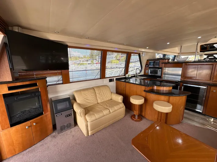  Yacht Photos Pics Luxurious interior of 2001 Carver 570 Voyager Pilothouse yacht with modern amenities.