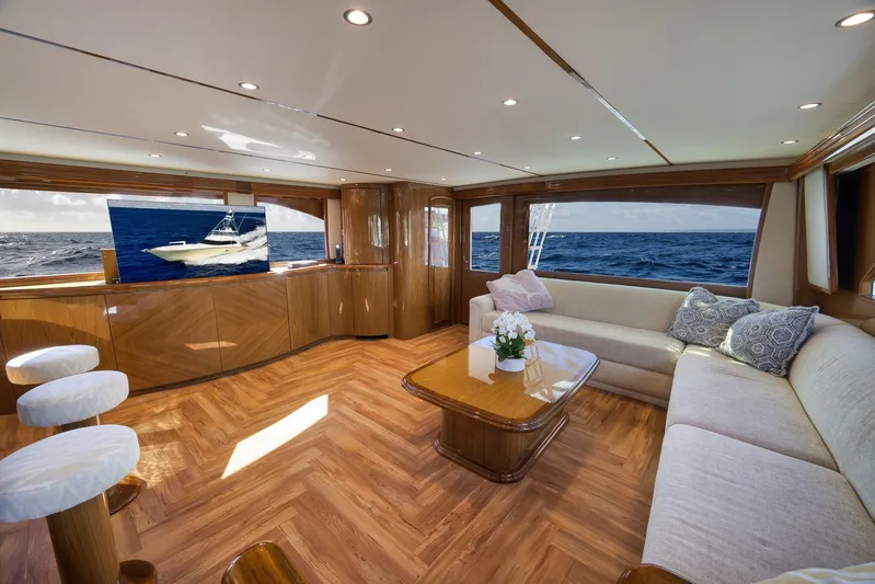 Monkey Business Yacht Photos Pics Luxurious interior of 2010 Viking 82 Convertible yacht with ocean view and elegant furnishings.