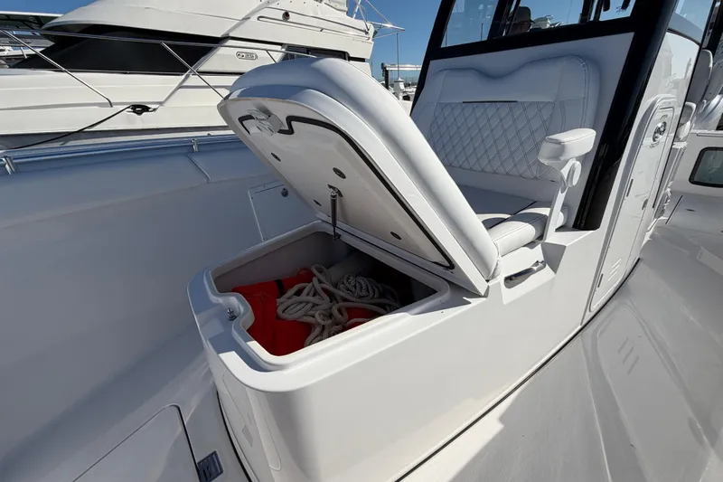  Yacht Photos Pics 2024 Sportsman Open 282TE Center Console with open storage compartment and seating.