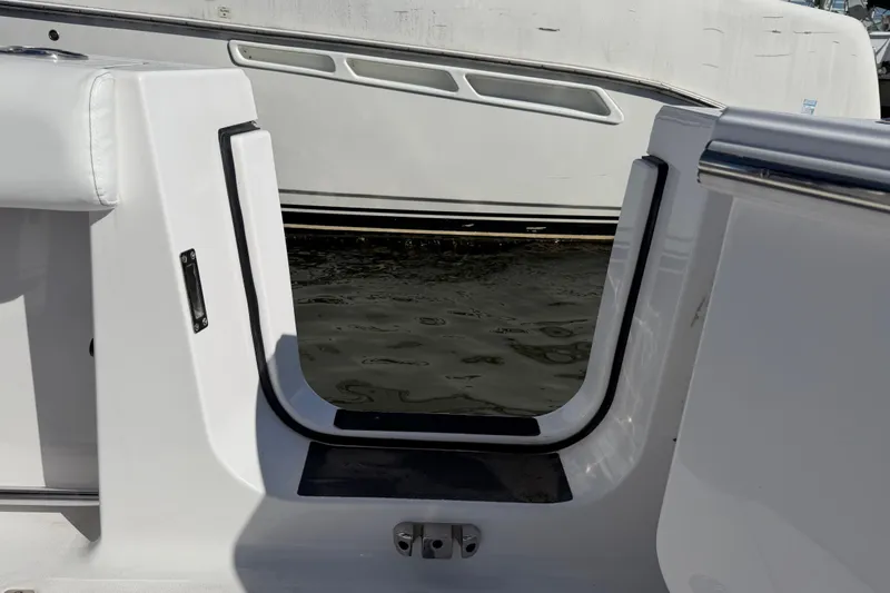  Yacht Photos Pics 2024 Sportsman Open 282TE Center Console boat, featuring a sleek entryway design.