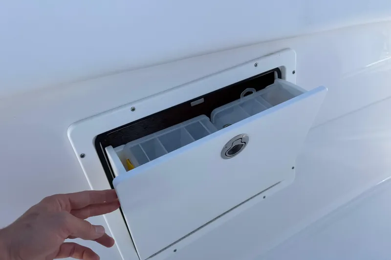  Yacht Photos Pics Storage compartment on 2024 Sportsman Open 282TE Center Console boat.