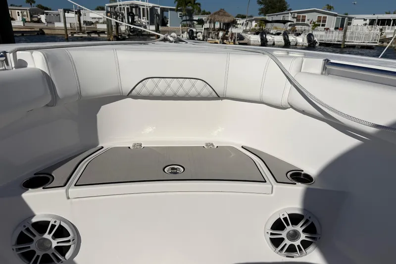  Yacht Photos Pics 2024 Sportsman Open 282TE Center Console boat interior with seating and speakers.
