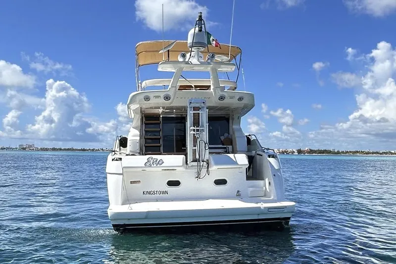 2008 Ferretti 510 Fly @ Cancun Yacht Photos Pics 2008 Ferretti Yachts 510 on calm water under blue sky.