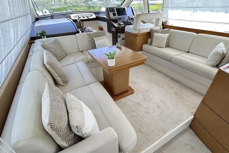 2008 Ferretti 510 Fly @ Cancun Yacht Photos Pics Luxurious interior of 2008 Ferretti Yachts 510 with plush seating and elegant decor.