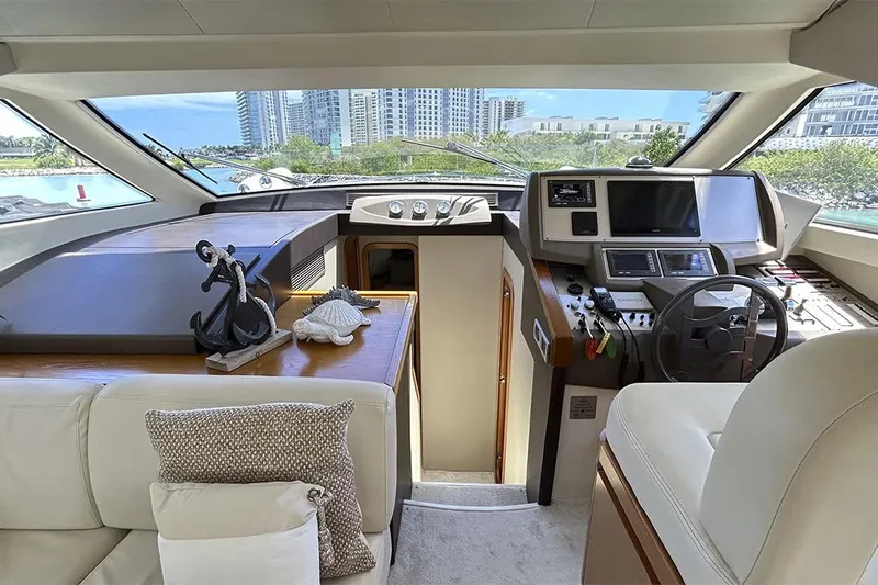 2008 Ferretti 510 Fly @ Cancun Yacht Photos Pics Luxurious interior of 2008 Ferretti Yachts 510 with modern helm and decor.