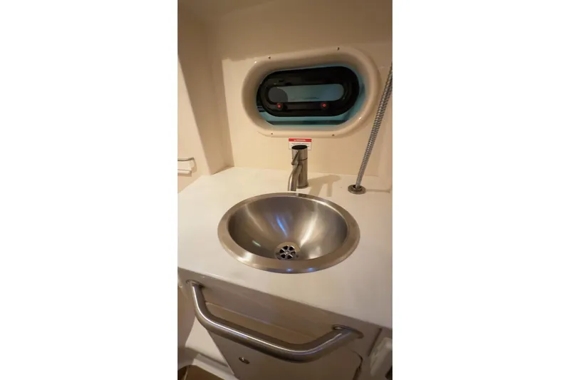  Yacht Photos Pics Stainless steel sink in 2017 Sea Ray 330 Sundancer boat bathroom.