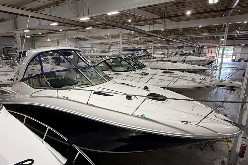  Yacht Photos Pics 2017 Sea Ray Sundancer 330 boats in indoor storage facility.