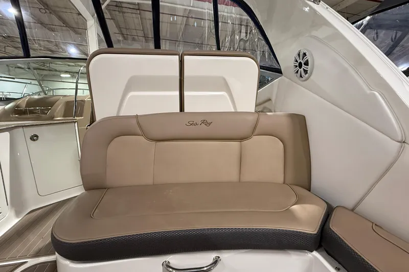  Yacht Photos Pics 2017 Sea Ray Sundancer 330 interior seating with beige upholstery and sleek design.