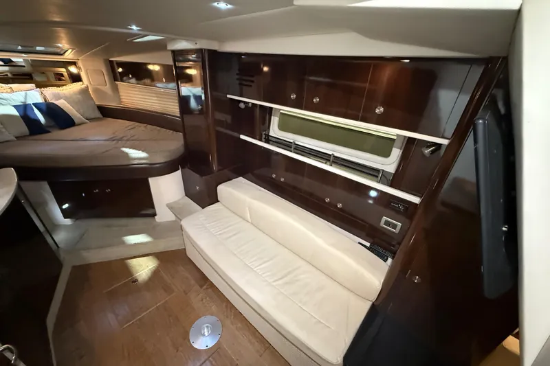  Yacht Photos Pics Luxurious interior of 2017 Sea Ray Sundancer 330 yacht with elegant wood finishes.