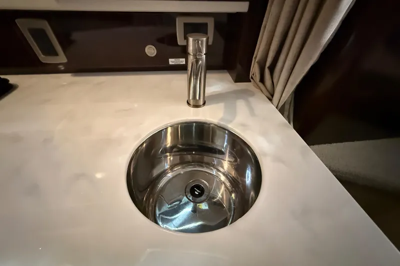  Yacht Photos Pics Stainless steel sink in 2017 Sea Ray Sundancer 330 yacht interior.
