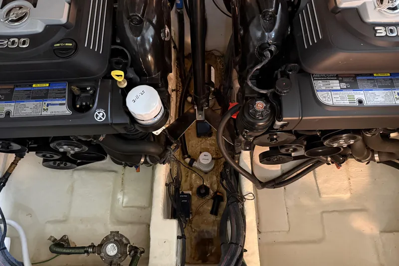  Yacht Photos Pics Engine compartment of a 2017 Sea Ray Sundancer 330, featuring dual MerCruiser 300 engines.