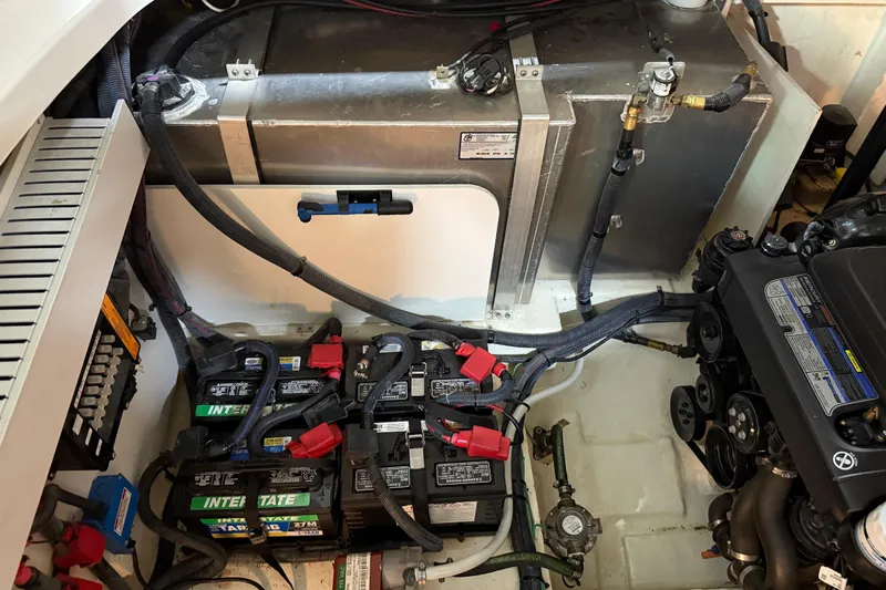  Yacht Photos Pics Engine compartment of a 2017 Sea Ray Sundancer 330 with batteries and mechanical components.
