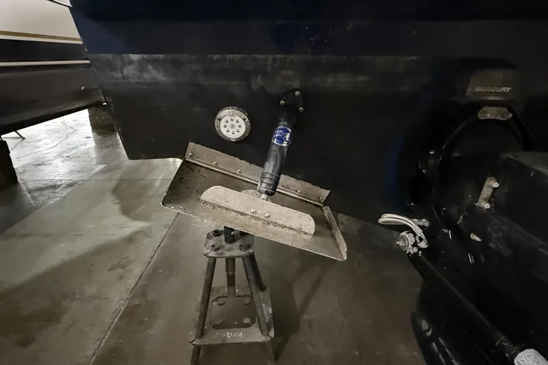  Yacht Photos Pics 2017 Sea Ray Sundancer 330 boat stern with trim tab and Mercury engine.