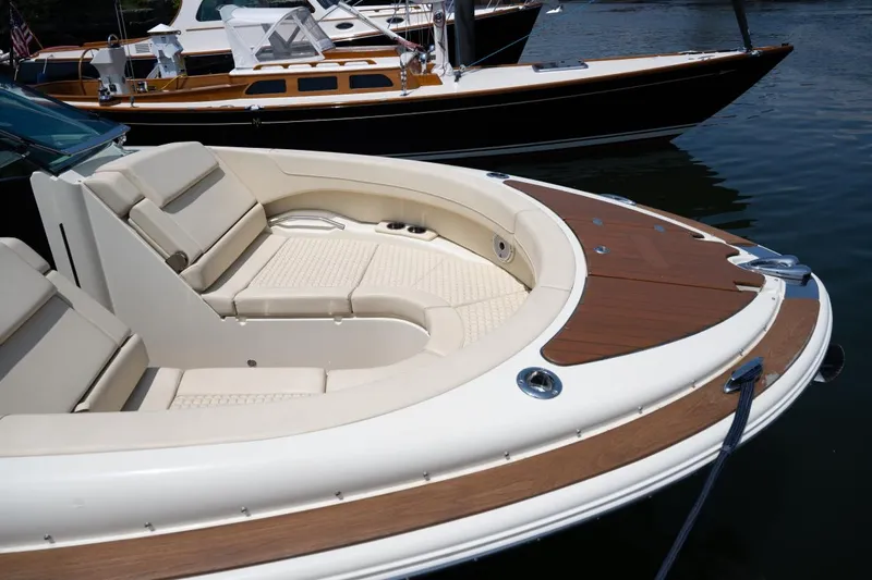Dunton Yacht Photos Pics 2021 Chris-Craft Launch GT boat with elegant seating and wooden deck details.
