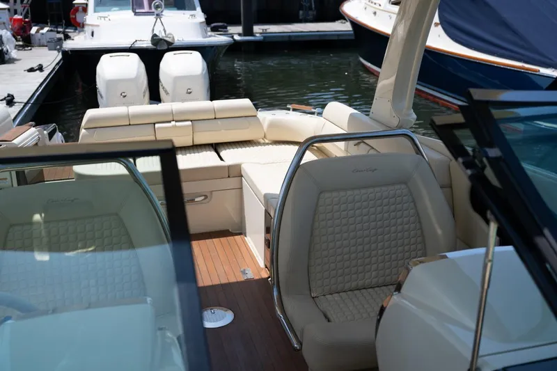 Dunton Yacht Photos Pics 2021 Chris-Craft Launch GT boat interior with luxurious seating and elegant design.