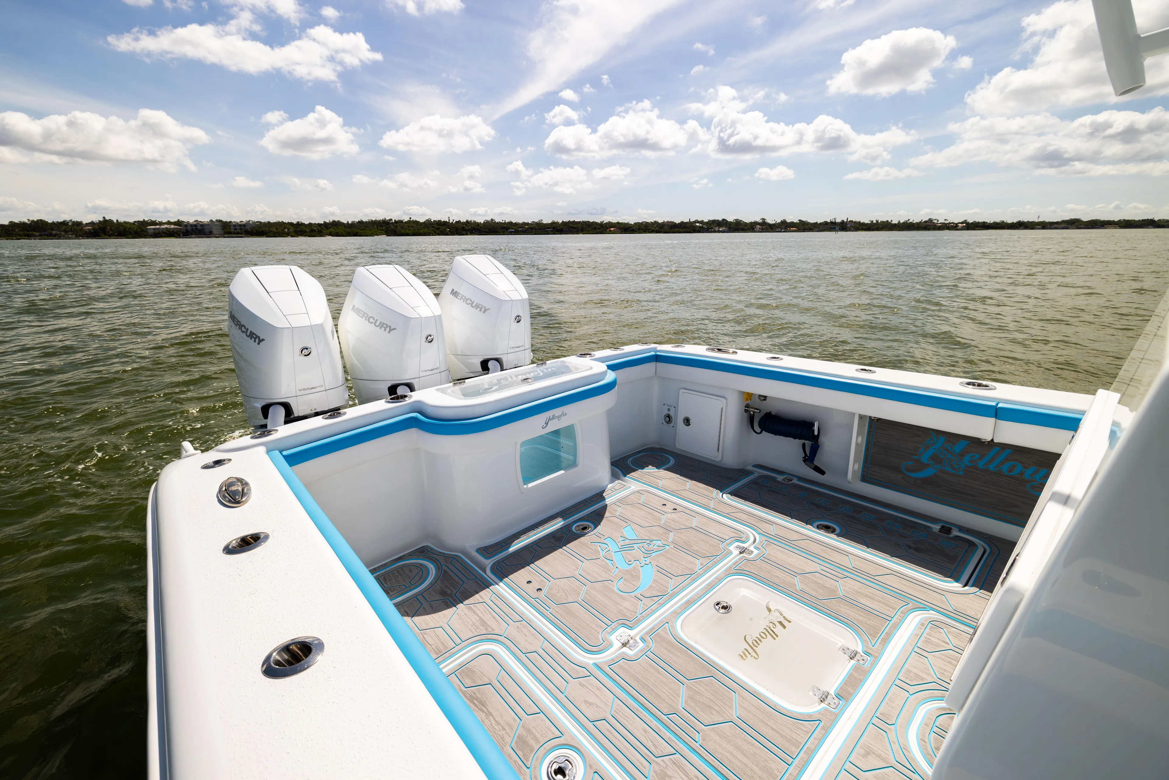  Yacht Photos Pics 2023 Yellowfin 36 Offshore boat with triple Mercury engines on calm water.
