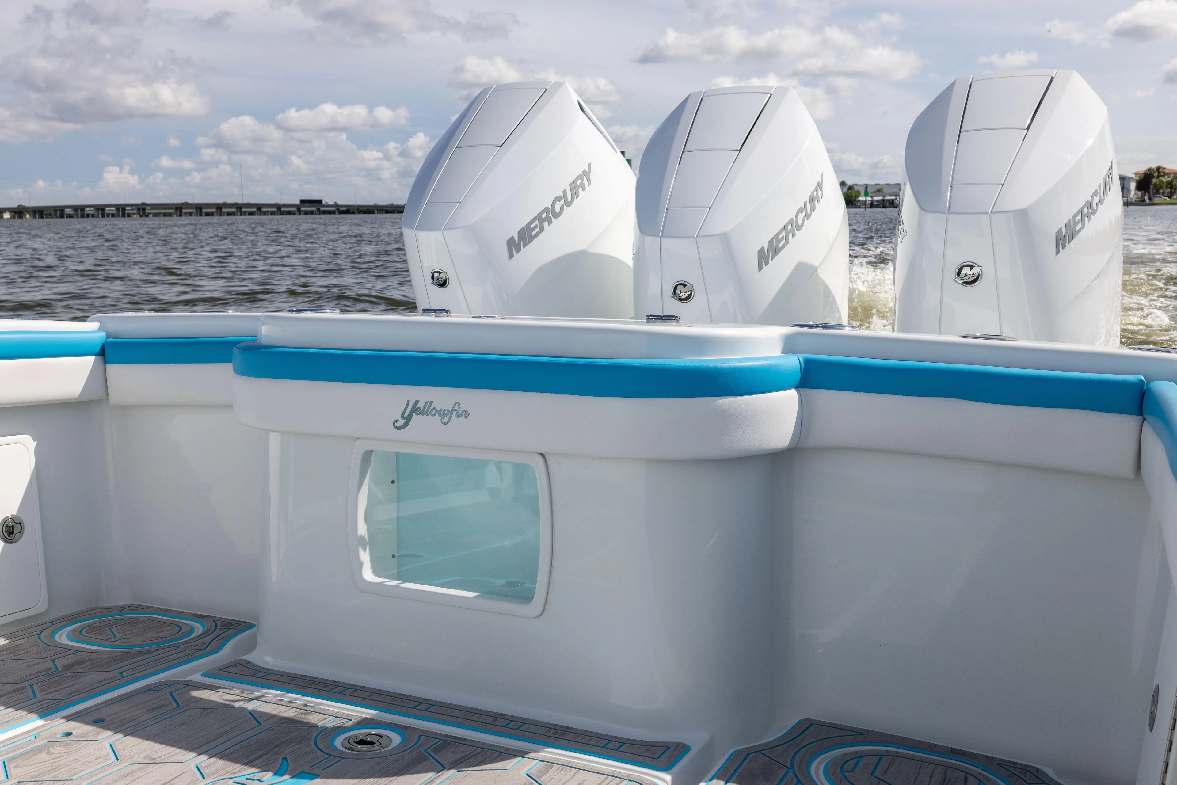  Yacht Photos Pics 2023 Yellowfin 36 Offshore boat with triple Mercury engines on open water.