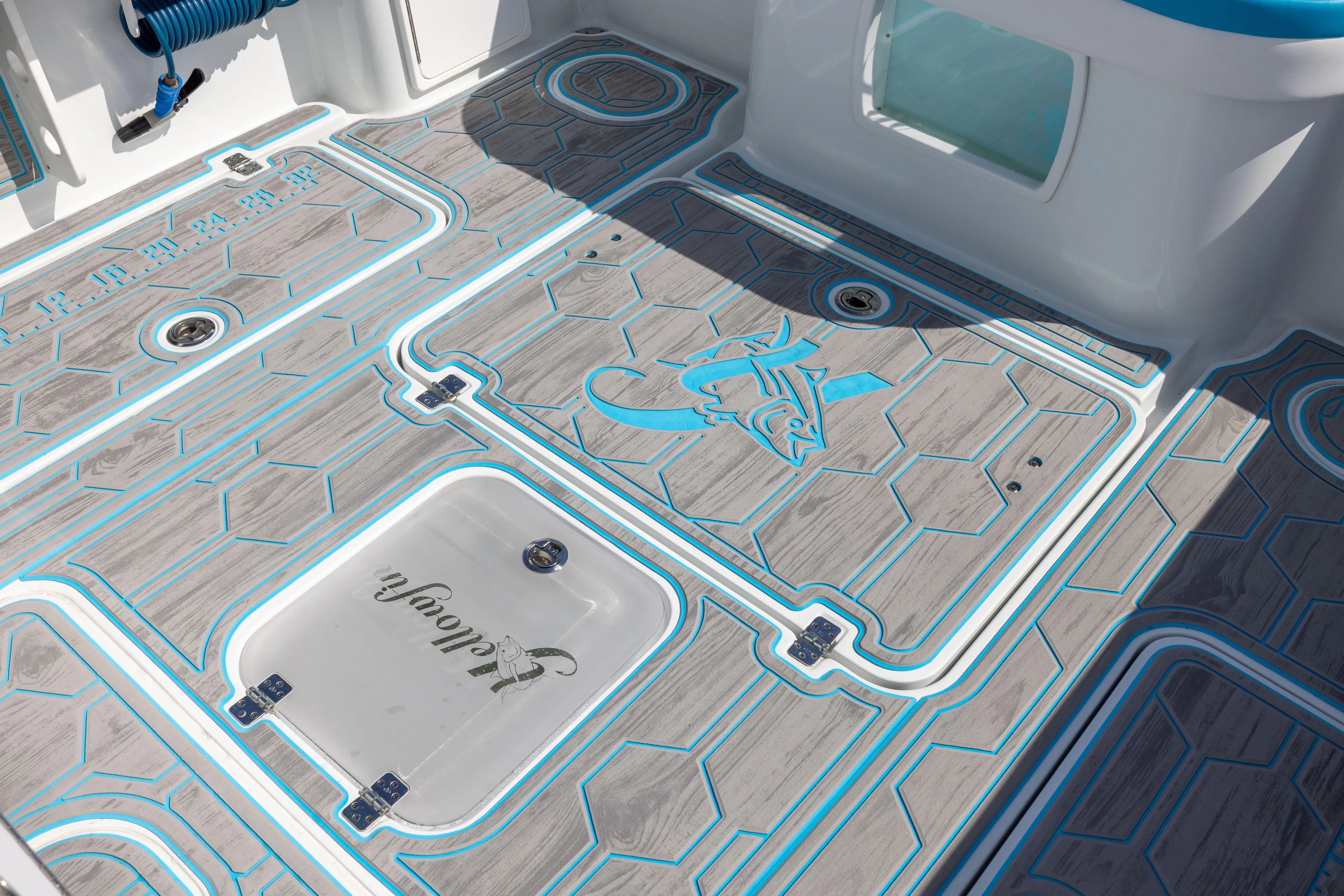  Yacht Photos Pics 2023 Yellowfin 36 Offshore boat deck with custom blue and gray design.