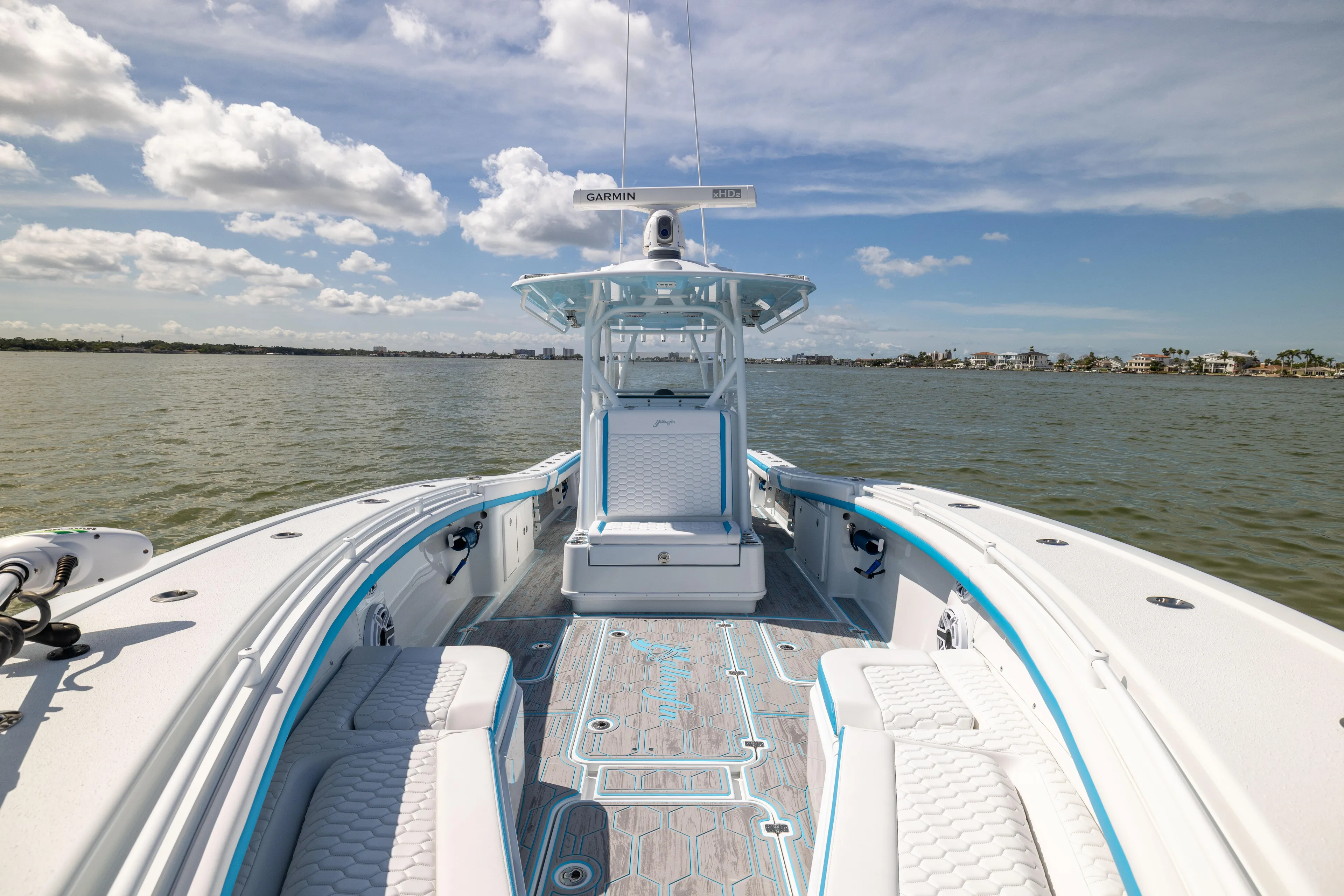  Yacht Photos Pics 2023 Yellowfin 36 Offshore boat on calm water, featuring spacious deck and modern design.