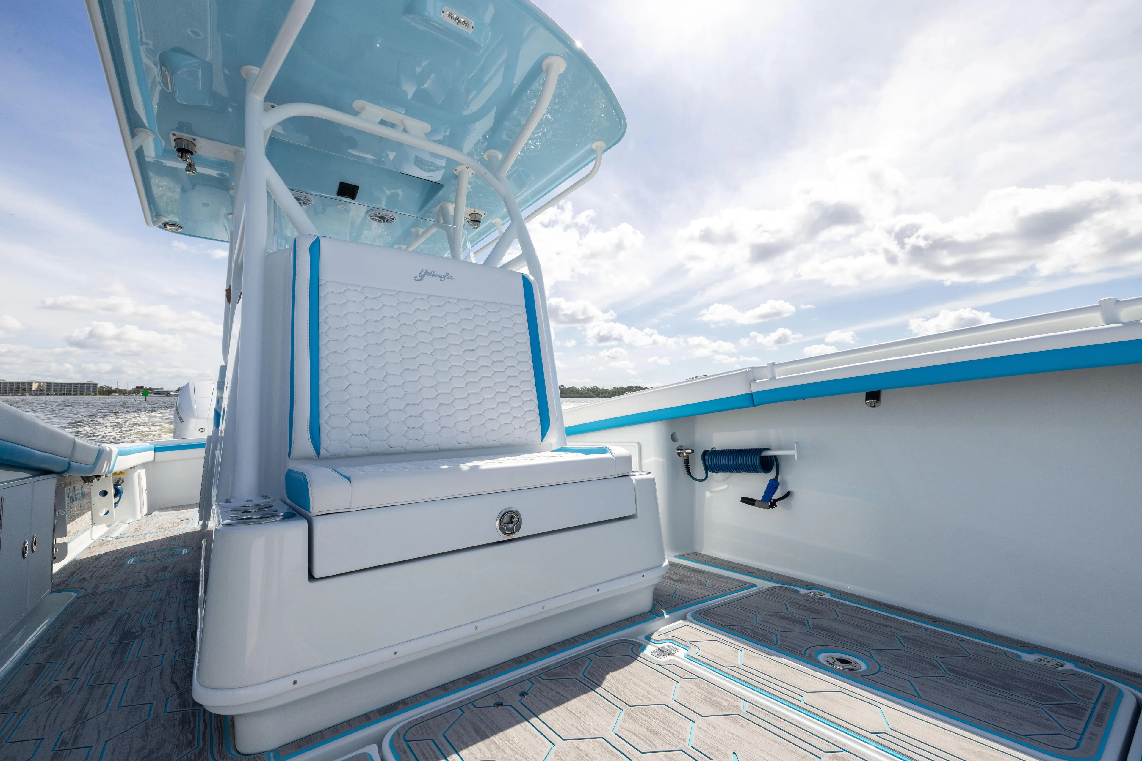  Yacht Photos Pics 2023 Yellowfin 36 Offshore boat interior with sleek seating and modern design.