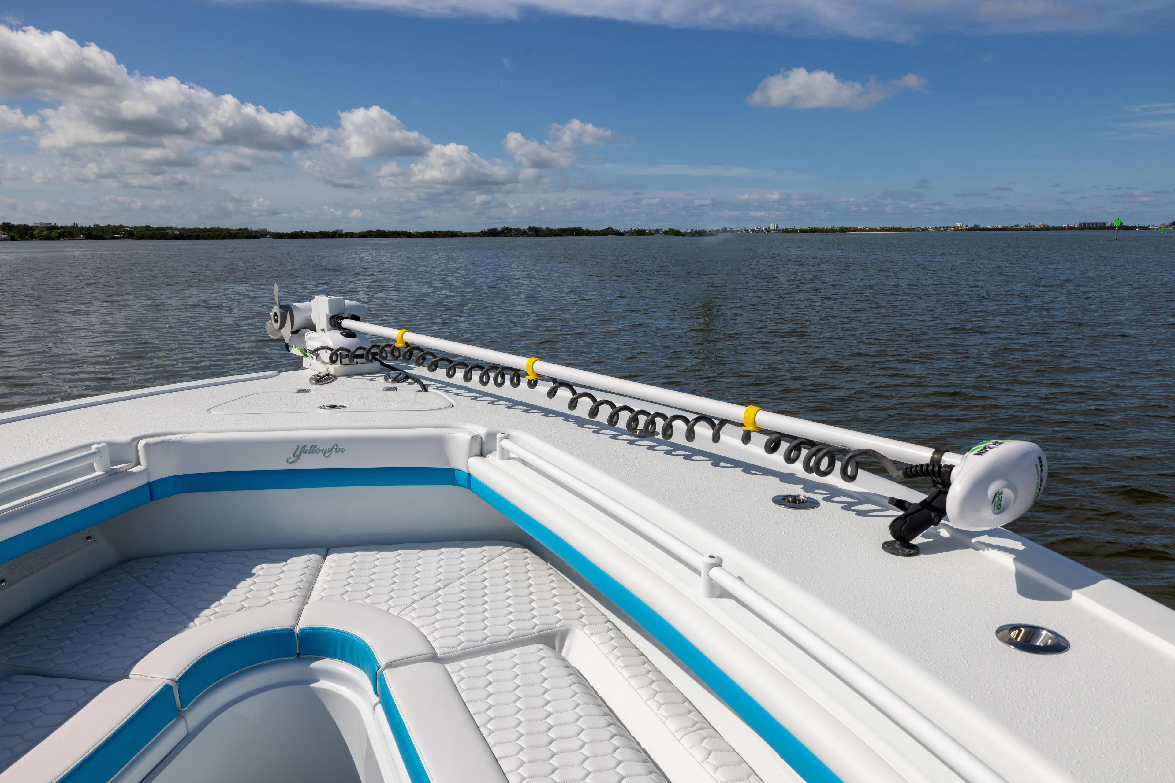  Yacht Photos Pics 2023 Yellowfin 36 Offshore boat on calm water under blue sky.