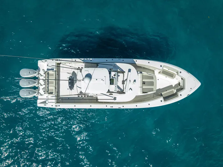 Two Roads Yacht Photos Pics Aerial view of 2021 Solace 41CS boat on clear blue water.