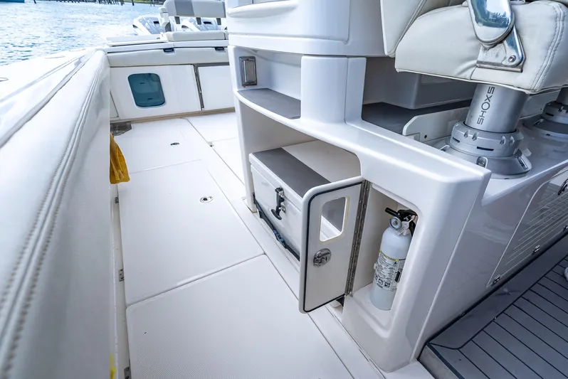 Two Roads Yacht Photos Pics Interior of 2021 Solace 41CS boat, featuring storage and seating area.