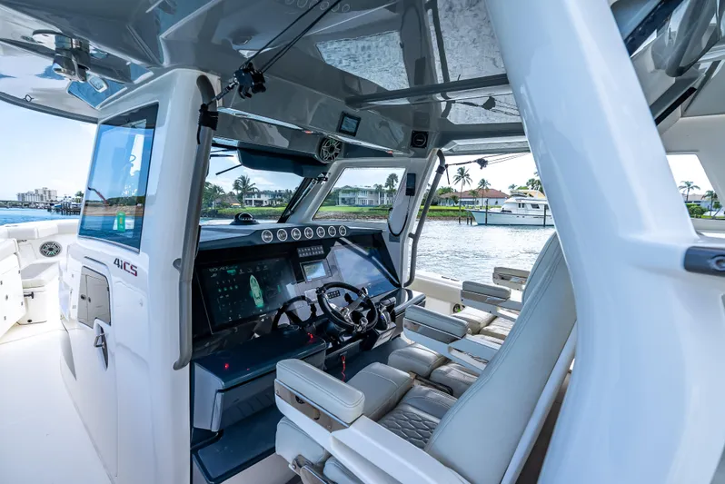 Two Roads Yacht Photos Pics Interior of 2021 Solace 41CS boat with modern helm and luxurious seating.