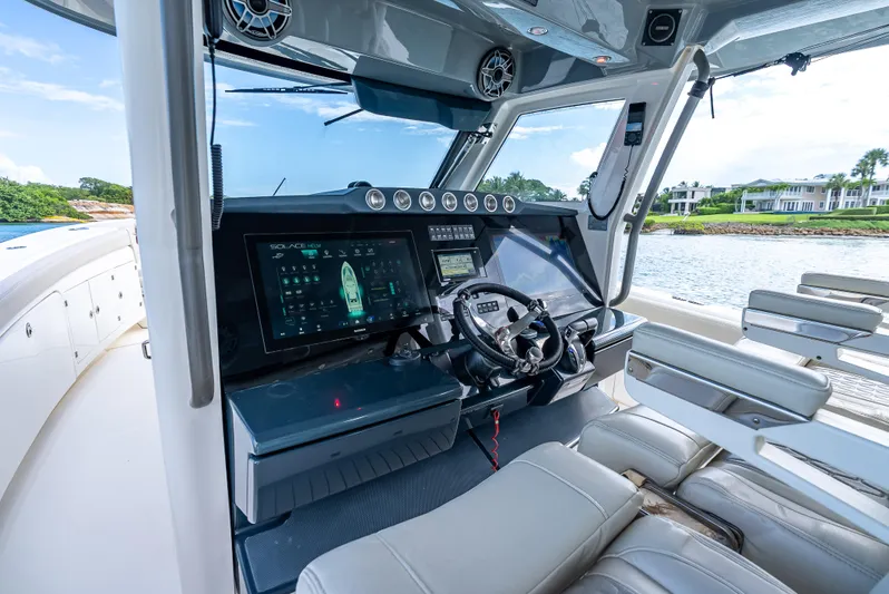 Two Roads Yacht Photos Pics 2021 Solace 41CS boat cockpit with advanced navigation system and luxurious seating.