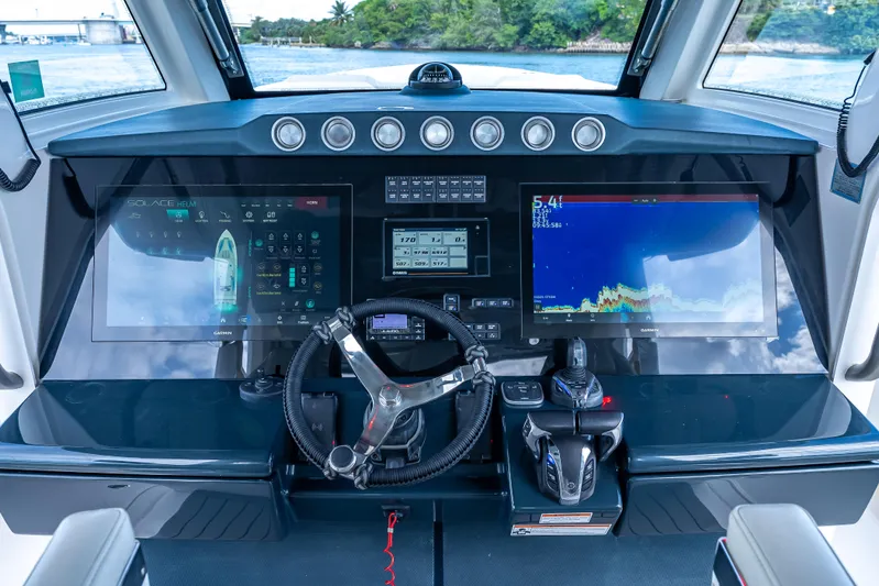 Two Roads Yacht Photos Pics Helm of 2021 Solace 41CS boat with advanced navigation displays and controls.