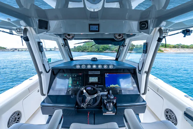 Two Roads Yacht Photos Pics Cockpit view of 2021 Solace 41CS boat with advanced navigation systems.