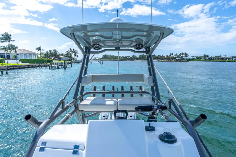 Two Roads Yacht Photos Pics 2021 Solace 41CS boat on serene water with clear blue sky.
