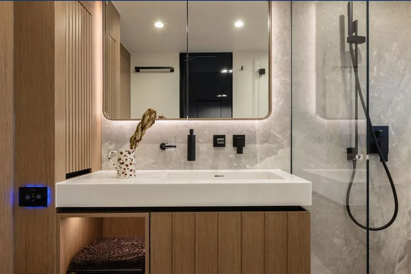  Yacht Photos Pics Luxurious bathroom interior on 2025 Sunreef Yachts 80 Eco, featuring modern sink and shower design.