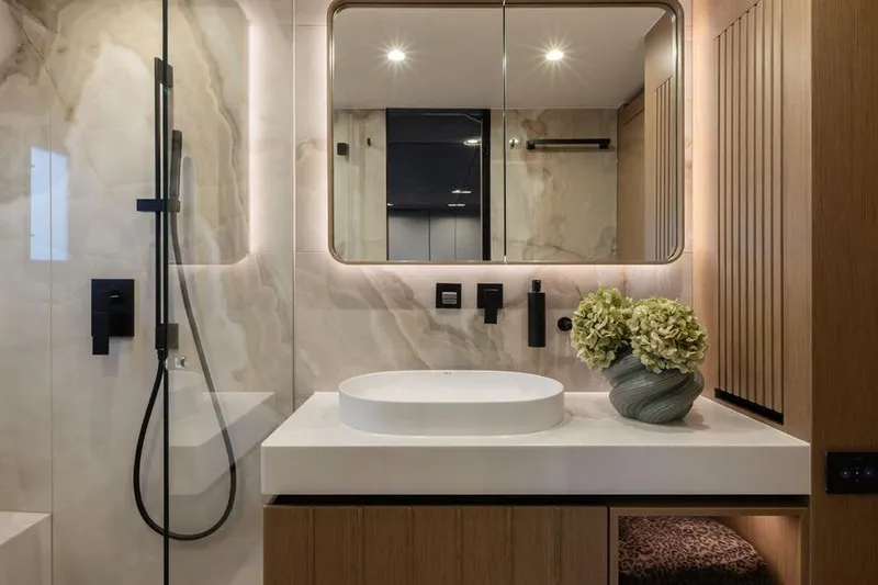  Yacht Photos Pics Luxurious bathroom interior on 2025 Sunreef Yachts 80 Eco, featuring modern fixtures and elegant design.