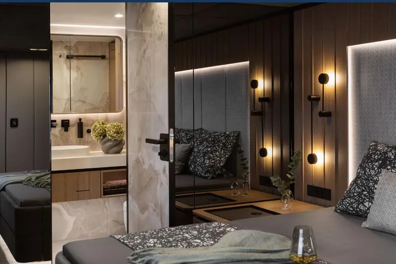  Yacht Photos Pics Luxurious interior of 2025 Sunreef Yachts 80 Eco, featuring elegant bedroom and bathroom design.