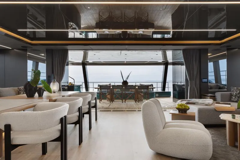  Yacht Photos Pics Luxurious interior of 2025 Sunreef Yachts 80 Eco, featuring modern furnishings and ocean view.