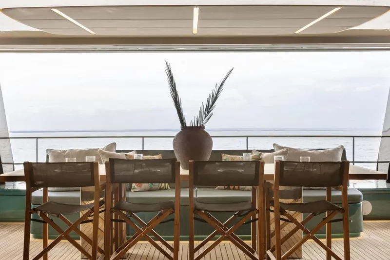  Yacht Photos Pics Luxurious Sunreef Yachts 80 Eco 2025 interior with elegant dining setup and ocean view.