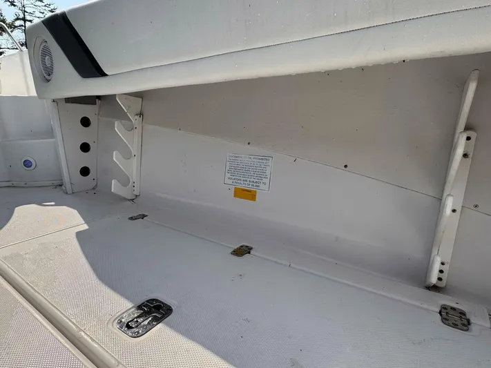  Yacht Photos Pics 2008 Donzi 38 ZSF boat interior with storage compartments and speaker.