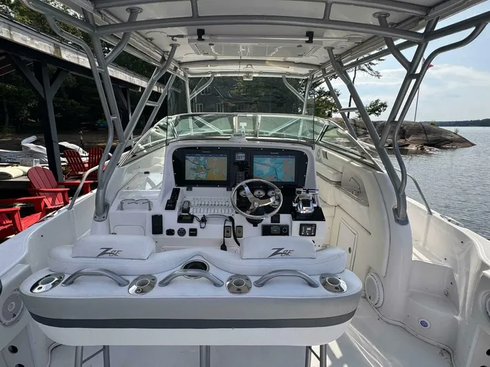  Yacht Photos Pics 2008 Donzi 38 ZSF boat cockpit with advanced navigation systems and comfortable seating.