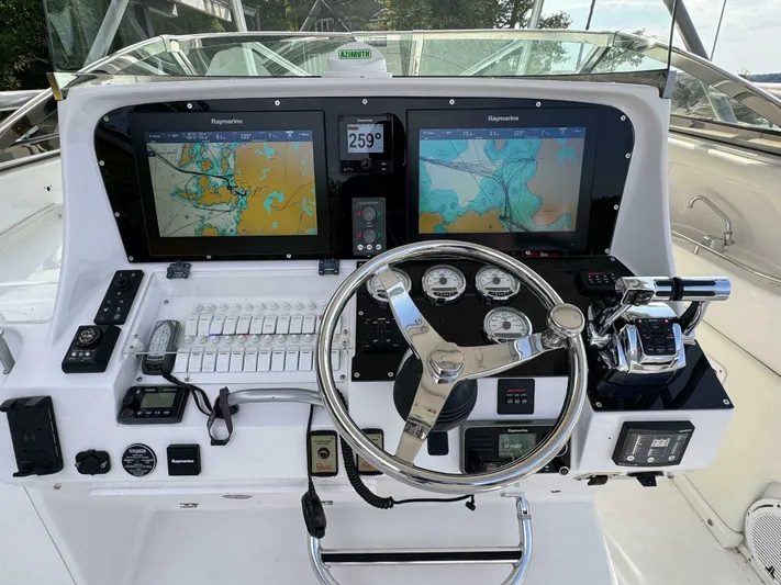  Yacht Photos Pics 2008 Donzi 38 ZSF boat dashboard with navigation screens and controls.